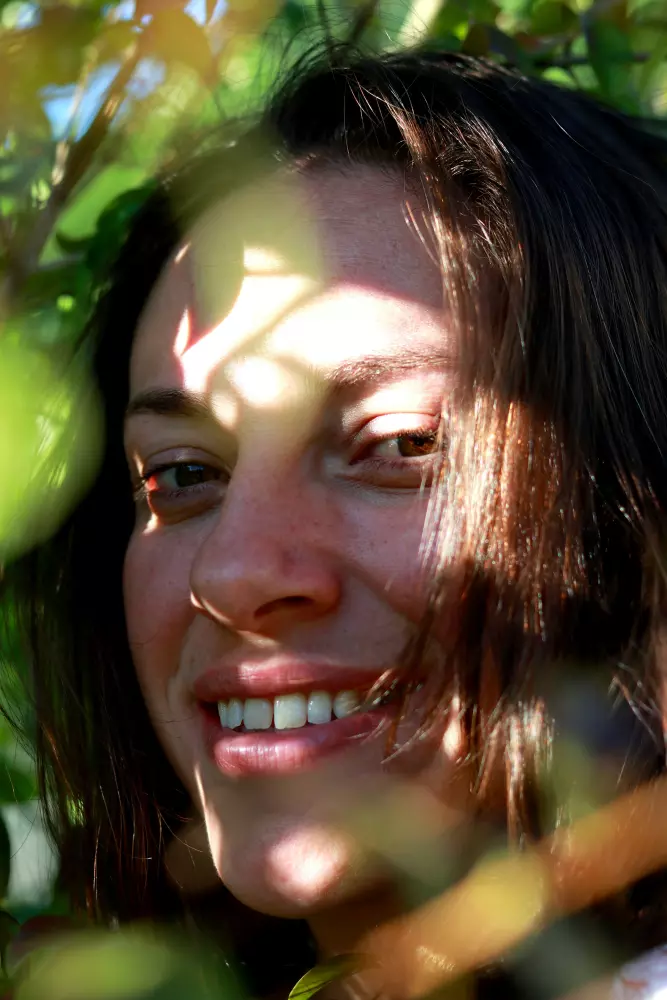 a close up of a person with a cell phone